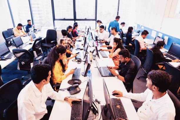 M2N Technology team working on client marketing strategy